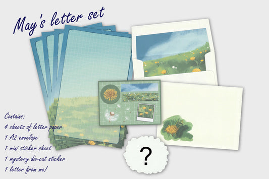 Letter set with stationery items including letter paper, an envelope, and stickers on a light gray background.